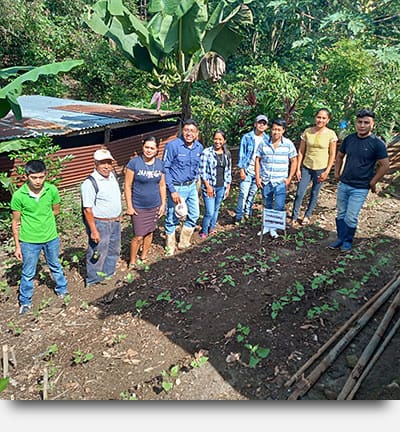 A photo of the Seeds for a Future team at their permaculture demonstration garden in Guatemala.