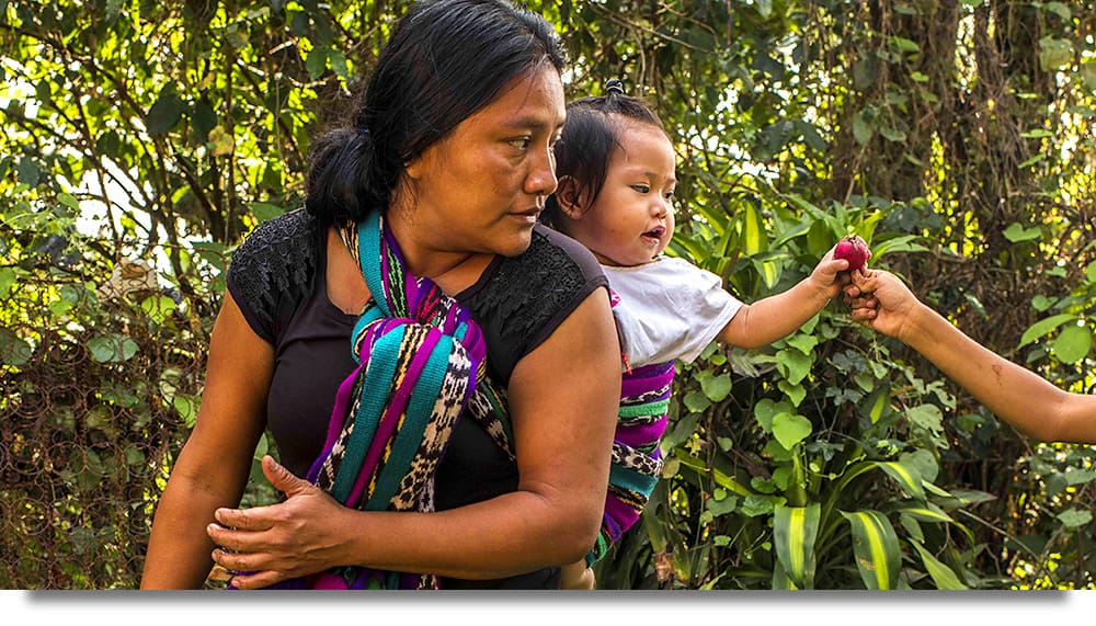 Photo of a Guatemalan mother and her infant, part of the nutritional education element of the Seeds for a Future Program.